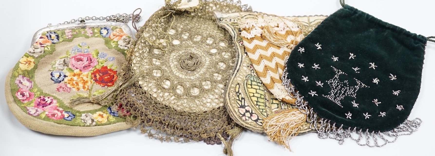 A collection of 19th and early 20th century crochet, embroidered and beaded reticules, evening bags and bible bags